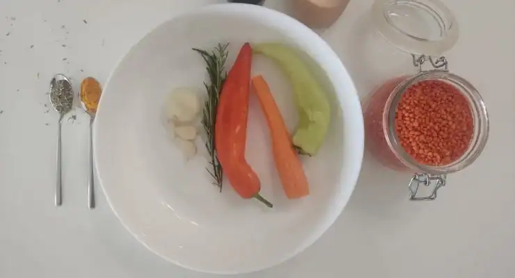 Ingredient for red lentil  soup: carrot, garlic, onion, rosemary, red lentil, oregrano,, black pepper, banana pepper and red horn pepper.